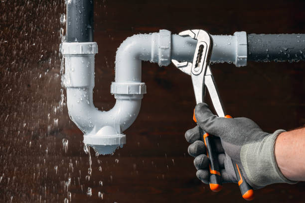 Professional Plumbing technician working in Versailles, CT